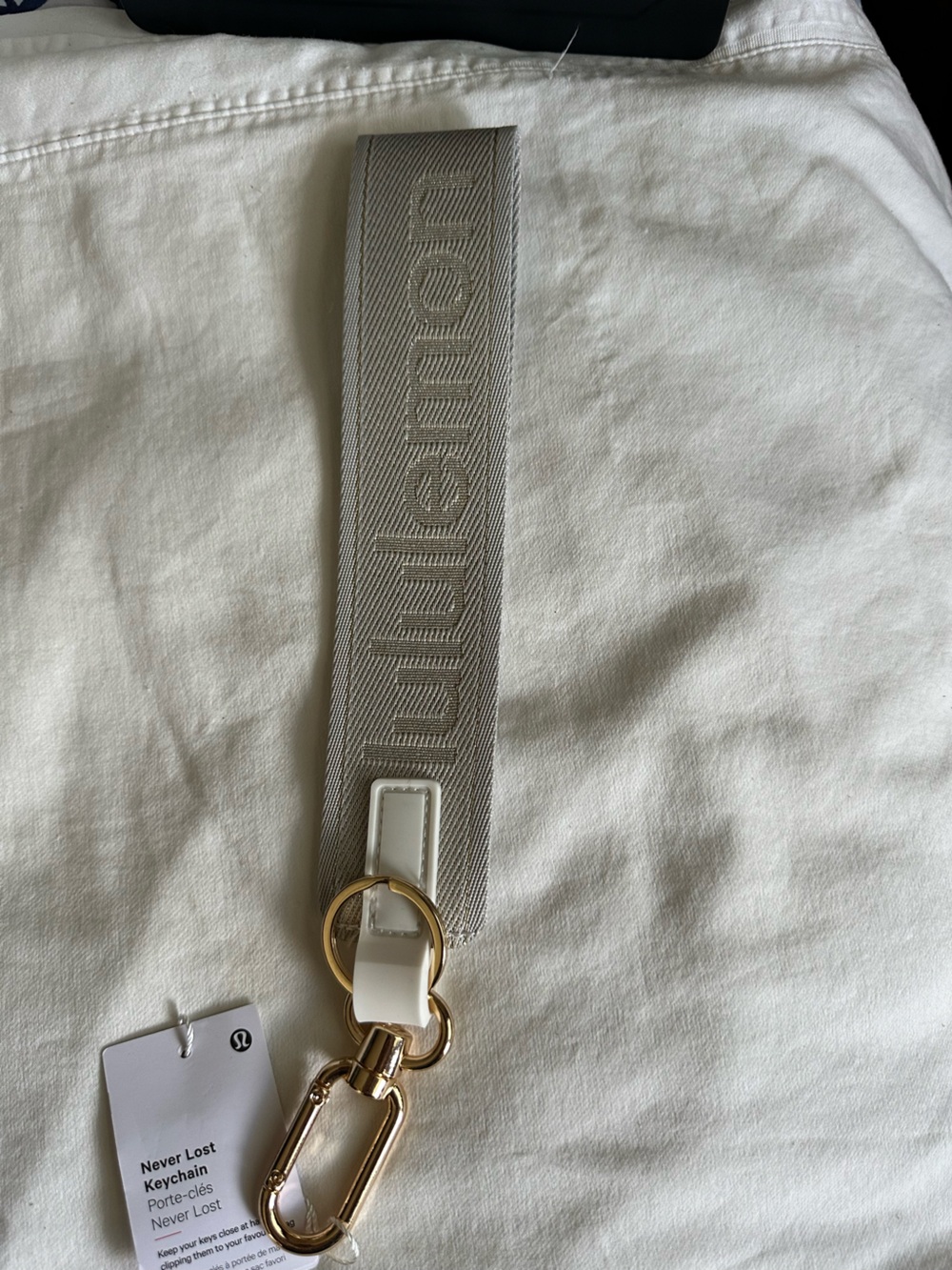 lululemon athletica Gray Logo Strap Keychain with Gold Ring never lost keychain